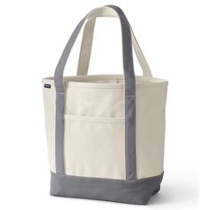 "This iconic Lands' End canvas tote is designed to withstands the test of time, featuring durable, reinforced details. This iconic Lands' End canvas tote is designed to withstands the test of time, featuring durable, reinforced details. Wide felled seams allow it to stand upright, keeping contents inside Water-resistant base and trim Pockets inside keep your smaller items easy to find and secure Neatly-stitched seams give it a clean look 17""W x 6""D x 13.5""H Handle: 9'' drop Interior: 3 slip p Tote Bag Size, The Test, Garden Tote, 6 D, Open Top, Canvas Tote Bag, Lands End, Key Rings, Canvas Tote