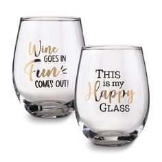 two wine glasses with the words wine goes in fun comes out and happy glass on them