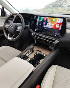 the interior of a car with an entertainment system