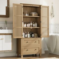 a wooden cabinet filled with lots of bottles next to a bathtub and sink in a bathroom