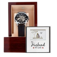 "Give the gift of luxury with this handsome and daring timepiece. The Men's Skeleton Watch is the perfect blend of classic design and modern styling, making it an essential accessory for your remarkable style. This watch sports a genuine leather strap, is splash resistant, and has increased durability thanks to hardened mineral glass. Our unique skeleton dial feature allows you to peer directly into the inner workings of your watch. Beautifully crafted to be automatic, this watch requires motion Husband Birthday Surprise, Personalized Watches, First Anniversary Gifts, Birthday Gifts For Husband, 1st Anniversary Gifts, Anniversary Gifts For Husband, Husband Birthday, Watches Unique, Anniversary Gifts For Him