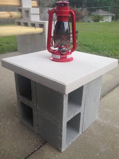 a red lantern sitting on top of a white box