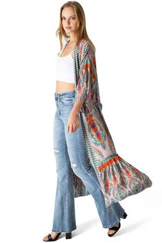 This stunning duster kimono features a classic longline silhouette with a ruffle panel along the bottom and a self tie belt at the waist. Bright bohemian mixed prints throughout layer perfectly with any causal basics. CARE | Hand Wash Cold or Dry Clean CONTENTS | 100% Viscose MEASUREMENTS | 48"/122 cm Top to Bottom (Size O/S) MODEL | 5'8 - wearing O/S IMPORTED Duster Kimono, Mixed Prints, Belt Tying, Mixing Prints, Tie Belt, Long A Line, S Models, Kimono Top, Women's Top