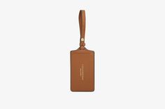 Revive any bag or suitcase with the Strathberry Luggage Tag. This useful accessory is handcrafted with calf leather and features a discreet card insert to add in your personal details; ensuring practicality for the discerning traveller. Whether for yourself or as a special gift, it will be sure to add a personal touch to the travel experience. Luggage Tag, Luggage Tags, Travel Experience, Special Gift, Tan Leather, Personal Touch, Calf Leather, Special Gifts, Tags