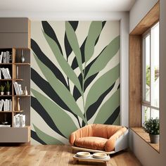 a living room with a chair, bookshelf and bookcase on the wall