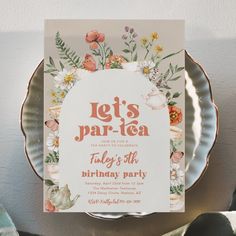 a birthday party card sitting on top of a plate