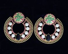 Contemporary Handcrafted Gold plated pearl, Turquoise,blue,ruby and pink gemstone studded Chandelier earrings.Light weight Bollywood Asian earrings for wedding, engagement, anniversary, mother's day and valentine gifts for bridesmaids, Wife, Mother, Sister or Gift for Loved ones. Earrings Length: 2 inches and width: 2 inches Visit my store: https://www.etsy.com/shop/SreeJewelry to see more awesome collections. Pink Round Temple Jewelry Earrings, Pink Temple Jewelry Round Earrings, Round Jeweled Party Earrings, Round Jewel Party Earrings, Temple Jewelry Gemstone Earrings For Party, Multicolor Gemstone Accented Earrings For Wedding, Multicolor Gemstone Accent Earrings For Wedding, Festive Round Earrings With Jewels, Pink Gemstone Accented Earrings For Party