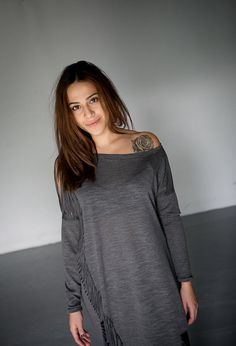 Ripped side top/Distressed women's top/cyberpunk style top/asymmetric ripped blouse A loose top that is slashed at the side front and back . Made of light cotton Lycra , everyday wear with layering or not. Alternative spirit women, casual but smart,edgy way of living! Oversized Ripped Crew Neck Top, Trendy Long Sleeve Distressed Tops, Edgy Summer Tops With Frayed Hem, Trendy Oversized Ripped Tops, Edgy Ripped Tops For Fall, Edgy Asymmetrical Tops For Spring, Relaxed Fit Asymmetrical Tops For Layering, Edgy Tops With Asymmetrical Hem For Spring, Edgy Top With Asymmetrical Hem For Spring