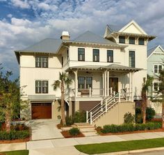 a large white house with lots of windows