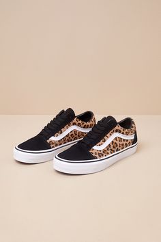 Grab the Vans Old Skool Animalier Black Suede Lace-Up Sneakers anytime you want to look casually iconic! Durable canvas fabric (with a trendy leopard print throughout) and genuine suede leather come together to shape these must-have kicks with a rounded toe upper and a lace-up vamp with black laces. The signature Sidestripeâ„¢ accents the insole and outsole. Low-cut, padded collar tops a sturdy bumper sole that features the classic waffle outsole! Logo tag at the heel. 1" rubber heel. Cushioned Cheetah Print Shoes, Logo Tag, Suede Lace, Collar Top, Rubber Heels, Black Laces, Vans Old Skool, Old Skool, Low Cut