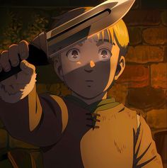 a boy with a knife in his hand