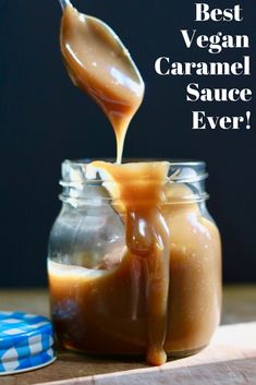 caramel sauce being poured into a jar with the words best vegan caramel sauce ever