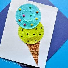 an ice cream cone is made out of paper plates