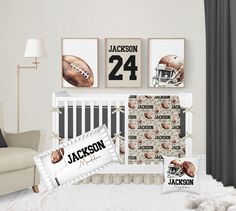 a baby's room decorated with sports memorabilia and football posters, including a crib