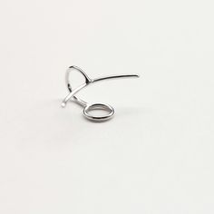 Handmade polished sterling silver ear cuff. A crescent line on the front, and a circle on the back to hold the cuff securely in place. Dimensions: 23x15mm Width: 1mm Sold: Individually or as a pair * Suitable for non-pierced ears. Also available in a longer version: https://www.etsy.com/listing/234077755/circle-long-line-sterling-silver-ear Visit my shop: http://www.etsy.com/shop/jewelrymirta © MIRTA Modern Single Earring With Open Ring Shape, Modern Open Ring Ear Cuff For Pierced Ears, Modern Open Ring Ear Cuff, Modern Open Ring Ear Cuff As Gift, Adjustable Sterling Silver Ear Cuff With Ear Wire, Minimalist Pierced Adjustable Ear Cuff, Minimalist Adjustable Pierced Ear Cuff, Modern Open Ring Earrings For Pierced Ears, Modern Single Ear Cuff Open Ring