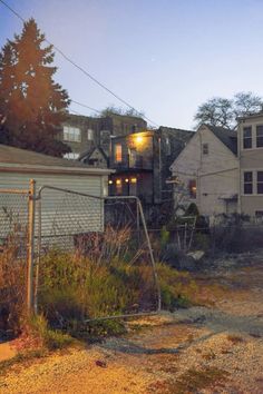 an old run down house in the evening