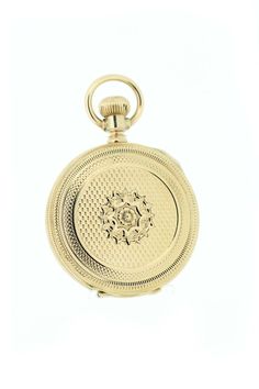 This 14 yellow gold Waltham pocket watch has a beautifully engraved watch case that has a star like flower in the center, surround by geometric patterns. The other side of the case has a flower engraved shield with "J.F.A". The dial is is porcelain and has a hairline from 1-6, but is still sound otherwise. The dust cover is blank and the movement is marked "W.M. Ellery" and 2467929.The case of the watch measures 41.06mm round and sits 13mm tall.--Please reference our policy for more details-- ** Engraved Yellow Gold Pocket Watch With Round Dial, Timeless Engraved Yellow Gold Watch, Self-winding Yellow Gold Pocket Watch With Round Dial, Self-winding Yellow Gold Pocket Watch, Formal Yellow Gold Medallion Watch, Heirloom Engraved Yellow Gold Pocket Watch, Yellow Gold Self-winding Round Pocket Watch, Yellow Gold Self-winding Pocket Watch, Engraved Yellow Gold Round Watch