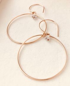 Just as effortless as they are simple, these hoop earrings are an essential everyday piece. Item Details: • This listing is for A PAIR ( 2 pieces ) earrings.• All metal is components are sterling silver and 14k gold-fill• Hoops measure 40mm in diameter.• Herkimer quartz crystals prized, each Herkimer diamond is a natural entity and no stone is identical.• The order will arrive in a gift-wrapped box and free polishing cloth. It will be ready for gift giving. All our work is custom-made by hand in Delicate Everyday Hoop Jewelry, Simple Small Hoop Everyday Jewelry, Everyday 14k Rose Gold Hoop Earrings, Everyday Rose Gold 14k Hoop Earrings, Minimalist Small Hoop Rose Gold Jewelry, Simple 14k Gold Tarnish Resistant Hoop Earrings, Minimalist 14k Gold Hoop Earrings For Everyday, Dainty 14k Gold Hoop Earrings For Wedding, Minimalist Rose Gold Tarnish-resistant Hoop Earrings