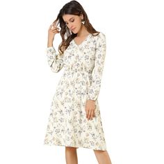 From the sophisticated smock waist to the front button detail, this is an ultra-feminine yet modern take on the midi. This fresh, romantic floral pattern livens up your spring/autumn look. Model Body Size: Height: 5'10", Chest: 33 inches, Waist: 24 inches, Hip: 34 5/8 inches, Weight: 122 lbs., model is wearing an XS. Size: medium. Color: white. Gender: female. Age Group: adult. Material: Polyester. Spring Daywear Midi Dress With Ditsy Floral Print, Spring Midi Dress With Ditsy Floral Print For Daywear, Spring Ditsy Floral Print Midi Dress For Daywear, Modest V-neck Midi Dress For Spring, Modest Floral Dress For Spring, Chic Spring Midi Dress With Ditsy Floral Print, Beige Floral Print Midi Dress, Spring Knee-length Ditsy Floral Midi Dress, Floral Print V-neck Midi Dress For Daywear