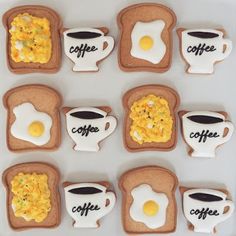 toasted cookies decorated with coffee and eggs are arranged in the shape of breakfast sandwiches