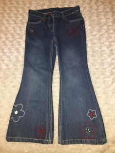 Gymboree Vintage Holiday Panda 2009 Blue Denim Jeans. Embroidered flowers,  zip and snap closure,  adjustable waist.  These are from the Outlet. Girls Size 6. Mint condition with no flaws.  No stains no wear. Cute Vintage Jeans, Cool Flare Jeans, Mushroom Jeans Paint, Cute Embroidered Jeans, Junko Jeans, Flowy Jeans, Homecoming Jeans Ideas, Embroider Jeans, Cute Flare Jeans