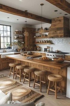 a kitchen filled with lots of wooden furniture