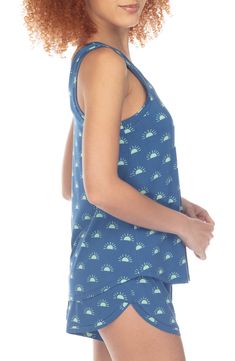 Streamline your evening routine with this soft jersey pajama set featuring a relaxed-fit tank and matching dolphin-hem shorts. 24" top length; 2" inseam; 30" leg opening; 12" front rise; 14 1/2" back rise (size Medium) Top has scoop neck; sleeveless 95% rayon, 5% spandex Machine wash, line dry Imported Comfortable Summer Activewear For Loungewear, Athleisure Pajama Shorts For Summer Relaxation, Summer Athleisure Pajama Shorts For Relaxation, Comfortable Summer Loungewear Activewear, Casual Tank Top For Sleepovers In Spring, Comfortable Summer Lounging Activewear, Sporty Pajama Shorts For Summer Relaxation, Casual Racerback Tankini, Spring Tank Loungewear Sleepwear