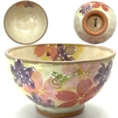 a flowered bowl with two bowls in the middle and one on the other side