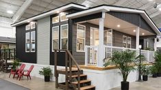 a tiny house is on display in a showroom