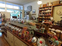 the inside of a store filled with lots of food and condiments on display