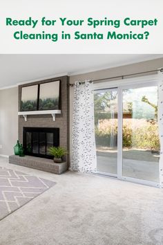 a clean living room with fireplace and sliding glass doors