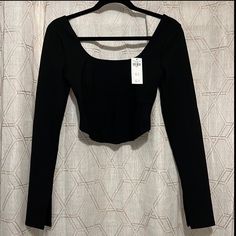 Black, Long Sleeve Corset Crop Top. Brand New With Tags. Very Good Quality. Fall Fitted Crew Neck Crop Top, Fitted Crew Neck Crop Top For Fall, Fitted Long Sleeve Crop Top For Night Out, Black Fitted Long Sleeve Top For Spring, Fitted Casual Long Sleeve Scoop Neck Top, Trendy Fitted Black Long Sleeve Top, Fitted Casual Long Sleeve Top With Scoop Neck, Fall Crop Top With Scoop Neck And Stretch Fit, Fitted Black Long Sleeve Top For Spring