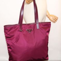 Brand: Prada Model: Tessuto Color: Burgundy Material: Synthetic Inclusions: Dustbag Dimensions: W34cm x H35cm x D10cm Serial number: 158 Country of origin: Romania Condition: A - excellent condition. Prada, a world-famous brand, is renowned for its distinctive and enduring style. The Prada Tessuto women's tote bag, in elegant wine red, is a sophisticated accessory designed in high-quality nylon. Its timeless design and meticulous craftsmanship make it an ideal choice to accompany your daily rout Designer Burgundy Shopping Bag, Designer Burgundy Bag For Shopping, Designer Burgundy Shoulder Bag For Shopping, Elegant Wine, Prada Model, Burberry Shoes, Luxury Products, Balenciaga Designer, Famous Brands