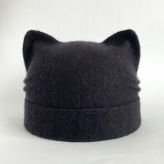 100% wool hat with a double brim is an indispensable accessory in the cold season. The felted hat from merino wool is warm, cozy and soft.  Cat beanie with ears is a perfect accessory to create a unique look. Hat with ears great gift for cat owners. This item is made to order and ready to ship in 3-5 business days after payment. Please choose size and color. ON THE first PICTURE size M. Circumference of your head is approximately 22,5 inches (57 cm), length approx 7.7+2 inch (19,5 cm+lapel 5 cm) Cheap Hats With Cat Design, Winter Fur Felt Hat, Fitted Winter Cap Costume Hats, Winter Hats With Ears, One Size Fits Most, Winter Beanie With Ears, One Size Fits Most, Gray Felt Hat For Winter, Gray Fitted Felt Hat For Winter, Winter Cat Ears Hat With Ears Detail, Fitted Winter Hat With Cat Ears