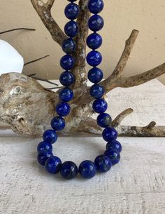 "Lapis Lazuli Short Necklace Sterling Silver Matching Earrings Included Each Sold Separately Excellent Quality Lapis Lazuli Beads Choice \"A\" is 8mm Lapis Lazuli Beads 16\" Long 18mm Sterling Silver Mariner Clasp Choice \"B\" 12mm Lapis Lazuli Beads 16.5\" Long 20mm Mariner Clasp (Push In Lever)" Classic Round Lapis Lazuli Jewelry, Lapis Lazuli Round Beaded Necklaces, Lapis Lazuli Necklaces With 8mm Beads, Lapis Lazuli Necklace With 8mm Beads, Necklace With 8mm Round Lapis Lazuli Beads, Elegant Round Lapis Lazuli Beaded Necklaces, Elegant Round Lapis Lazuli Beaded Necklace, Elegant Round Beaded Lapis Lazuli Necklace, Formal Lapis Lazuli Necklace With Round Beads