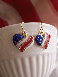 These earrings are for the patriot in all of us. Flag earrings will be perfect for your Independence Day party. Blue Patriotic Earrings For Independence Day, Patriotic Blue Earrings For Independence Day, Patriotic Drop Earrings For 4th Of July, Patriotic Earrings For 4th Of July, Patriotic 4th Of July Earrings, Patriotic American Flag Jewelry For 4th Of July, Patriotic American Flag Jewelry For Independence Day, Patriotic Earrings For 4th Of July Gift, 4th Of July Gift Drop Earrings