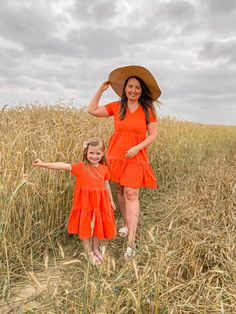 Hi Lovely Mothers ❤! I offer: Mother daughter matching dress. You'll feel so cozy in this short sleeve intensive pink dress that it's gonna be a wear-on-repeat staple in your wardrobe. Trust us: nobody's judging you shining every single day! Would you like to make a great team with your little one ? That's great, now you have a chance. * Would you like to have a different color of the dress? (orange, light pink, turquoise) Please check here: https://www.etsy.com/shop/MatchyMatchyMenza?ref=seller Playful Orange Dress For Spring, Playful Orange Short Sleeve Dress, Playful Orange Spring Dress, Playful Orange Beach Dress, Cotton Summer Dresses Matching Set, Cotton Summer Dresses In Matching Set, Casual Beach Dresses Matching Set, Casual Beach Dresses With Matching Set, Summer Vacation Dresses Matching Set