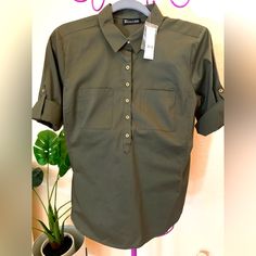 New Wt- 7th Ave Ny & Co Top With Buttons In Front. Army Green Color. Wear It Long Sleeves Or Folded. See Pictures For Details. Casual Khaki Office Top, Khaki Summer Office Tops, Khaki Office Tops For Summer, White Dress Top, White Peplum Tops, Top With Buttons, Paisley Print Blouse, Black Knit Top, Army Green Color