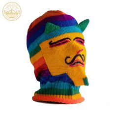 Embrace the winter chill with our Winter Wakollo Hat, a symbol of warmth and style. Crafted in Cusco, this hat is a true work of art, meticulously handwoven with the finest llama wool to keep you cozy in the most authentic Andean fashion. Product Features: Material: Made with the utmost care, the Winter Wakollo Hat is woven from the luxurious and insulating wool of the llama, ensuring both comfort and style during colder seasons. Size: Designed in a standard size, this hat offers a perfect fit f Casual Winter Beanie For Festivals, Casual Winter Festival Beanie, Quirky Handmade Winter Hats, Handmade Yellow Beanie For Winter, Knitted Mask, Knit Balaclava, Face Pulls, Knitted Balaclava, Andes Mountains