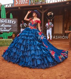 Look picture-perfect in this floral applique charro off the shoulder ball gown with A-line ruffled skirt by Ragazza Fashion MV54-154. This beautiful long off the shoulder dress features a sweetheart bodice, open lace-up back, and a floor length A-line skirt with a sweep train and ruffles. The cowboy hat shown in the catalog pictures is not included. Floral Charro Quinceanera Dress by Ragazza MV54-154 Designer: Morena y Esencial Pioneer Collection by Ragazza Fashion 2024 Style Number: MV54-154 Colors: Navy Blue/Red Sizes: 3, 5, 7, 9, 11, 13, 15 Availability: If this gown is in-stock, please allow 2 to 3 weeks for delivery. If this dress is not in-stock or in-production, please allow up to 5 months for delivery because Ragazza Fashion dresses are made-to-order. Ragazza has lots of Quince dre Quinceañeras Dresses, Quinceanera Royal Blue, Navy Blue Quinceanera, Navy Blue Quinceanera Dresses, Blue Quinceanera Dress, 1500 Dresses, Quinceanera Dresses Mexican, Xv Ideas, Birthday Luxury