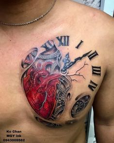 a man with a heart tattoo on his chest and clock in the middle of it