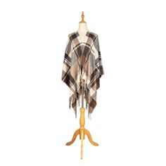 Need something to add to your wardrobe? Our Savannah poncho is just that! A perfect addition to any outfit and a quick grab to keep you nice and warm. Features: 100% acrylic 49" x 57" and 4" fringe on each end Open front oversized plaid poncho with twill weave and fringe at ends Handwoven Brown Poncho For Winter, Brown Long Sleeve Poncho For Outdoor, Winter Plaid Poncho, Bohemian One-size Woven Poncho, Bohemian Poncho For Outdoor, One Size, Open Front Poncho, Plaid Poncho, San Diego Hat, Fall Hats