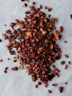 a pile of chocolate chips sitting on top of a table