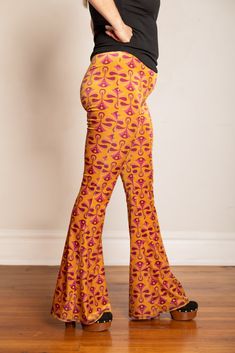 *These pants are Ready to Ship* Click to view Size Chart Inspired by Art Deco, we designed this print in collaboration with Flare Street. These velvet flares are super versatile and the perfect statement pants all year round. The lustrous Gold print can be dressed up or worn casually. SIZE CHART:Model is a 31" wearing a size LargeBe sure to check the size chart before ordering, these have a lot of stretch but do run a bit small. Say Hello To Flare Street! Let's spread the Flare-Love! Our flares Statement Pants, Velvet Flares, Gold Velvet, Gold Print, Melbourne Australia, Fabric Store, Quality Fabric, Two Piece Pant Set, Melbourne