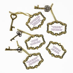 six antique key tags with words written on them and some keys attached to each other