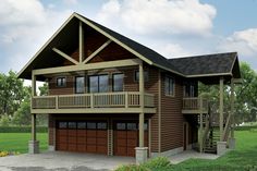 a two car garage with an attached porch and balcony on the second floor is shown