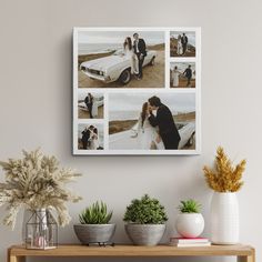 a couple kissing on their wedding day in front of some photos hanging on the wall