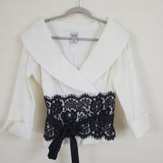 Xscape White Blouse With Lace Detail Size: 12 ~Does Have Stretch ~Black Lace Waist Detail With Tie Belt Nwot, Still Has Bar From Tag Measurements: (Flat Lay & Approx.) Length: 21" Armpit To Armpit: 20" Bundle And Save, Just By Adding Your Liked Items To A Bundle. Fitted Lace Top Blouse For Work, Formal Fitted V-neck Tops, Elegant Evening Tops For Spring, Elegant Spring Evening Tops, White Lace Top For Formal Occasions, Formal White Lace Top, Fitted Chic Lace Top Blouse, Elegant Fitted Blouse With Lace Top, Chic Fitted Lace Top Blouse