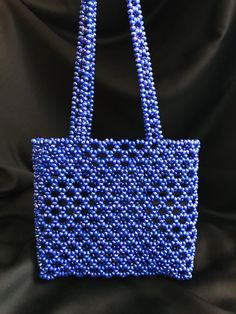 My bags are completely handmade. I design with natural beads and lovingly. This size is perfect for carrying your phone and wallet. I can produce bags according to your request. Details Handmade product, Only produced in 1 day, Suitable for daily use * Materials Crystal beads I send my shipment free of charge by express shipping. Canada: 3-7 business days United States: 3-7 business days North America: 3-7 business days Europe: 3-7 business days Crystal Bead Bag, Bead Bag, Produce Bags, Beaded Bag, Crystal Blue, Handmade Bag, Beaded Bags, Bag Vintage, Natural Beads