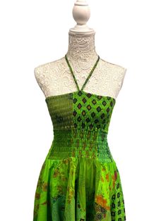 Brand New with tags by Festival StallOne size UK 8 10 12 14Green Patchwork pixie hem halter neck dressGet summer ready with this great little dress, beautifully made with in patchwork, with a fully smocked bodice and halter neck, flattering pixie hem. Length from top of bodice to longest point on hem is 42in (107cm)100% cottonCool handwash Fitted Bohemian Patchwork Dress, Green Sleeveless Patchwork Dress, Sleeveless Green Patchwork Dress, Green Sleeveless Dress With Patchwork, Green Fitted Halter Neck Sundress, Fitted Green Halter Neck Sundress, Green Halter Neck Dress For Festival, Sleeveless Patchwork Dress For Festivals, Fitted Hippie Dress With Patchwork